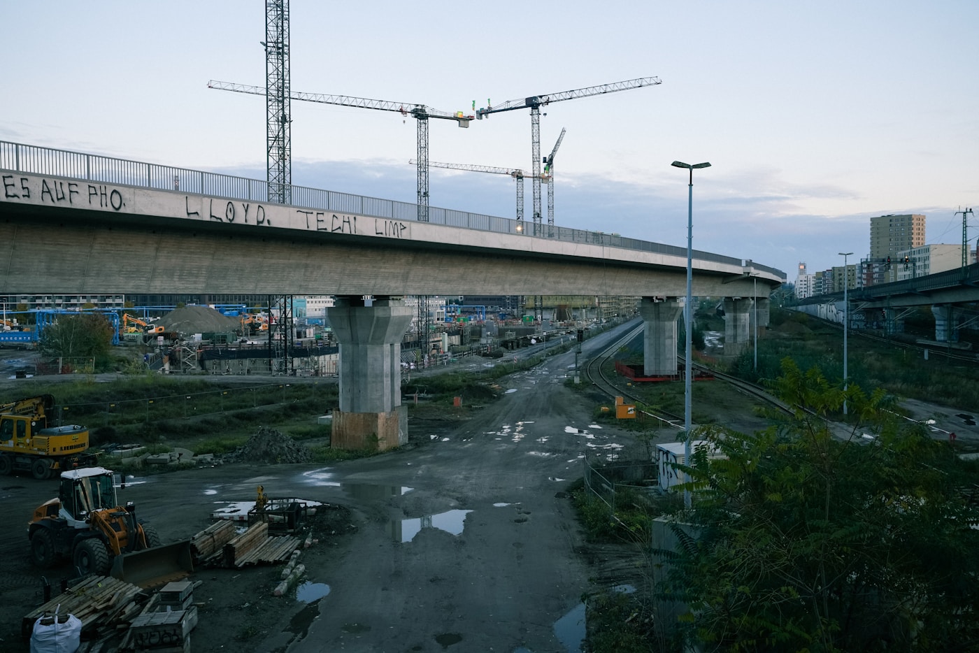 Bridge infrastructure construction with cranes