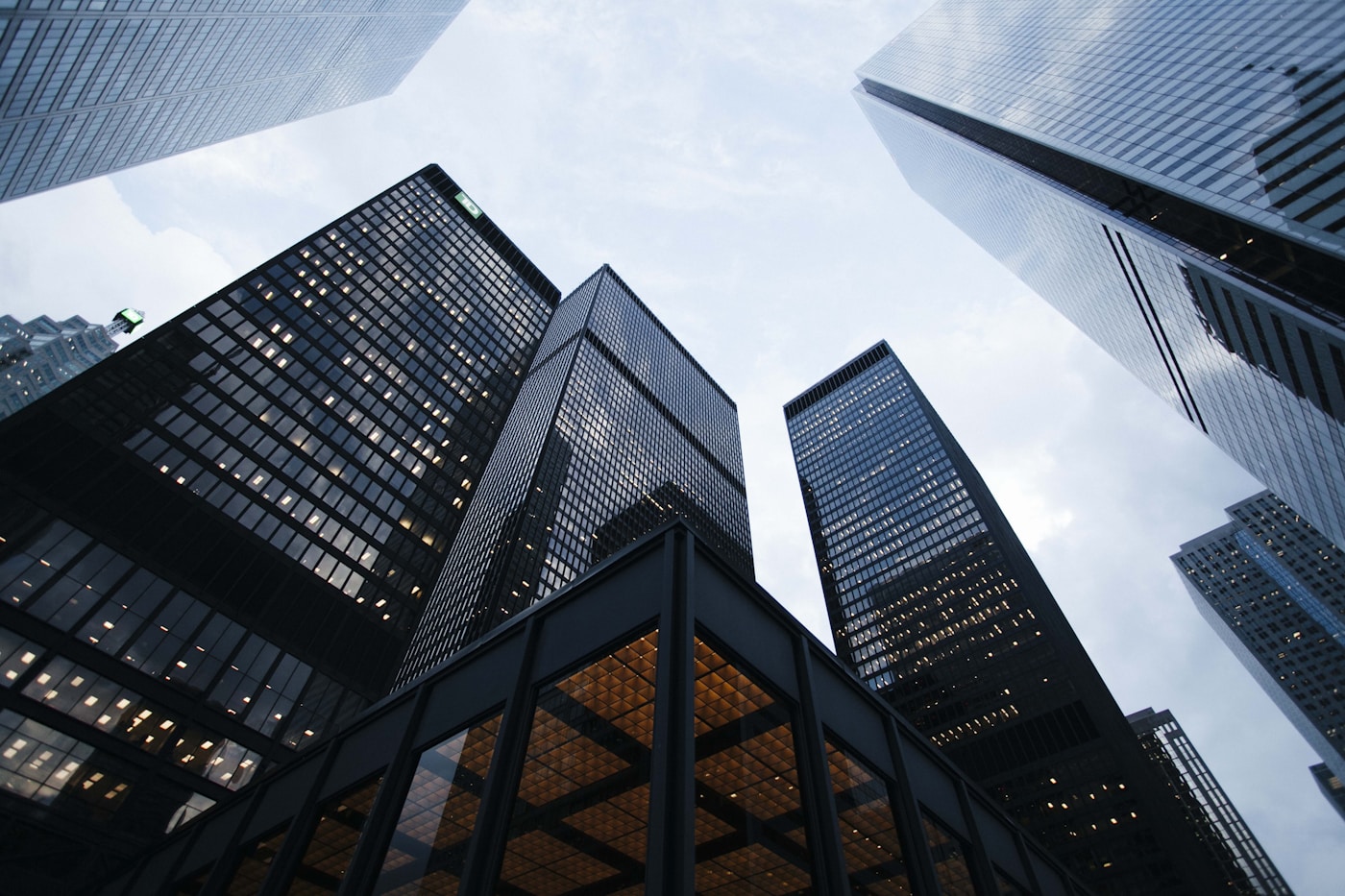 Low-angle view of a modern glass commercial building