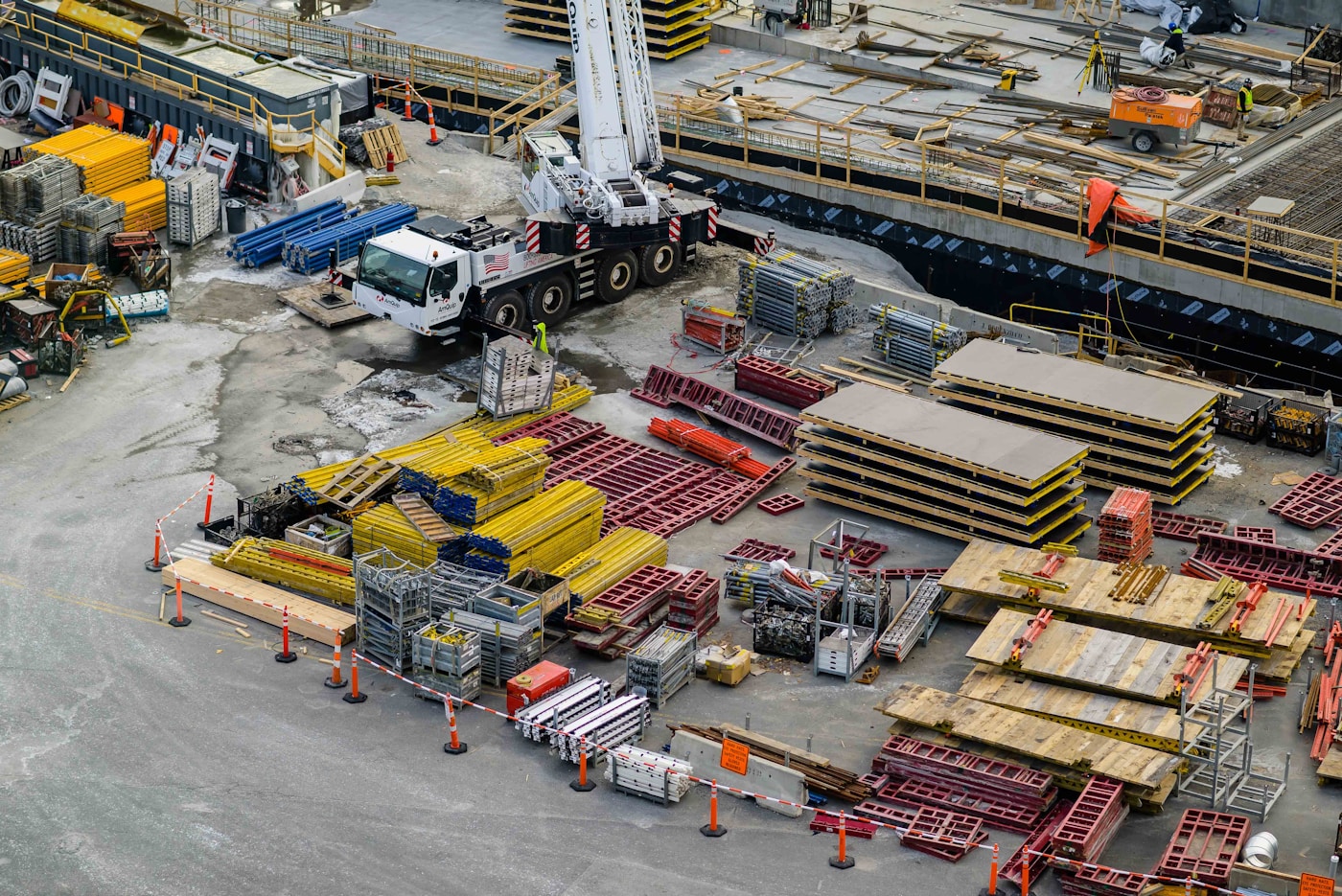 Active construction site with equipment and building materials
